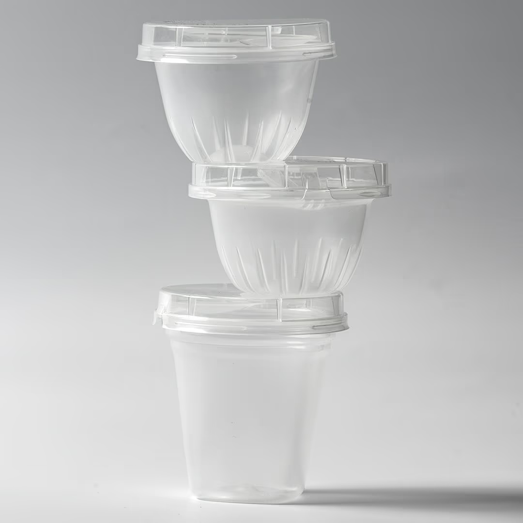 Thermoformed cups made from multilayer plastic sheets with high barrier properties to help protect against oxygen and moisture.